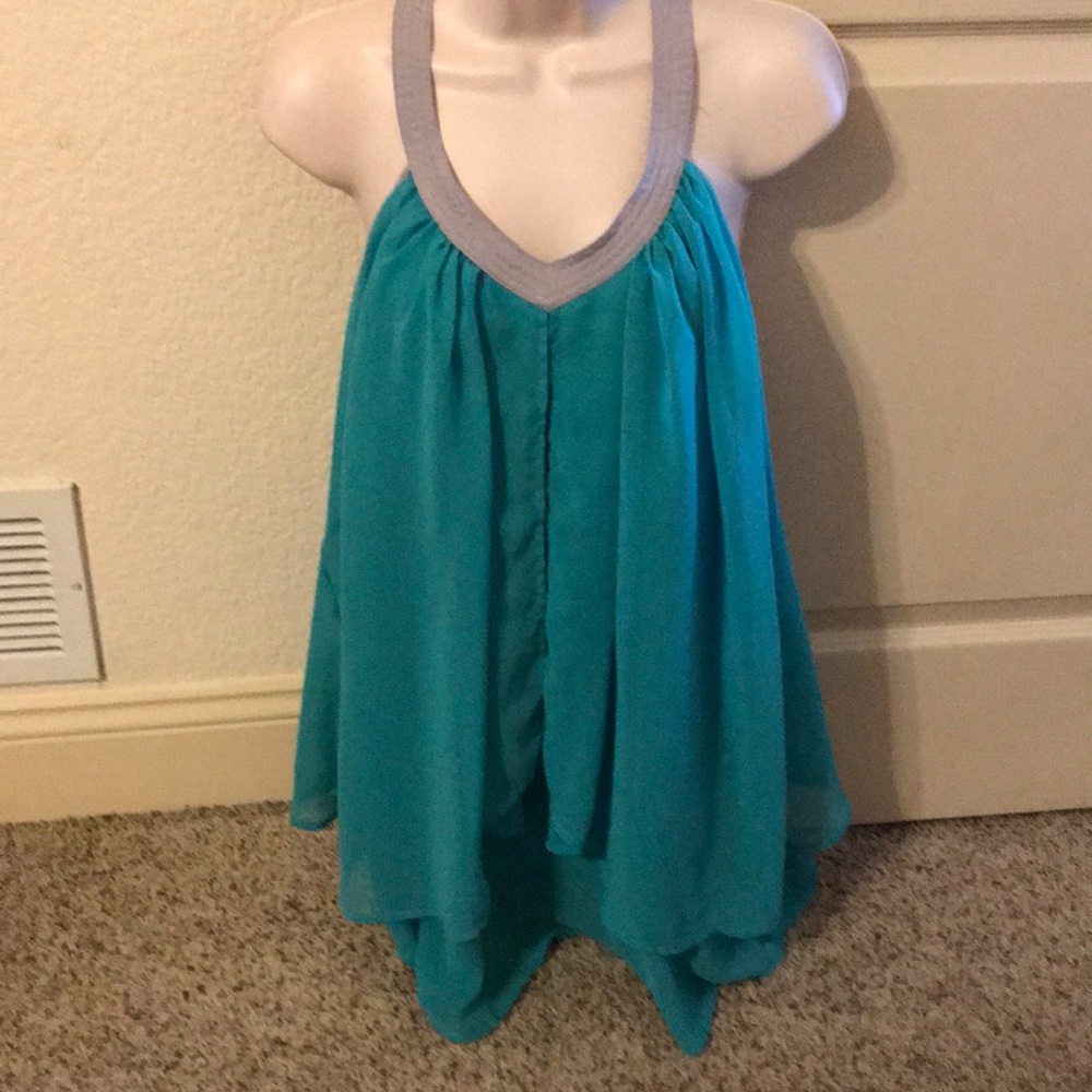 Never worn, can be worn as shirt or short dress